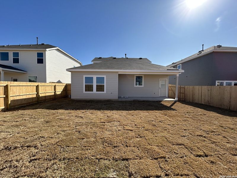 Exterior details and patio area of a home in Hennersby Hollow, San Antonio (Image 23).