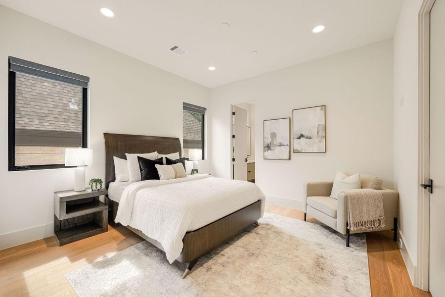 [SECONDARY BEDROOM] Spacious secondary bedroom with walk-in closet.
