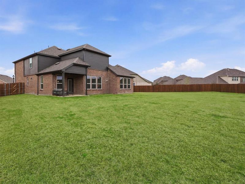 Exterior details and patio area of a home in , McKinney (Image 24).