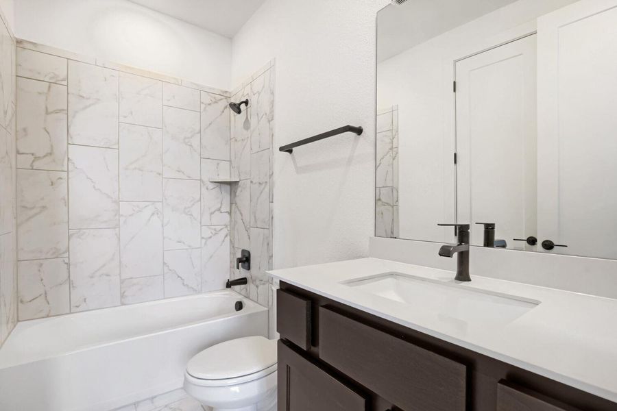 Furnished interior view inside a new home in 6 Creeks at Waterridge, Kyle (Image 14).