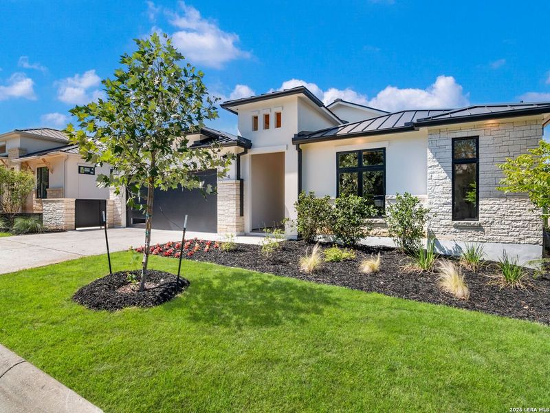 Front exterior of a new home in , San Antonio, TX, highlighting curb appeal (Image 1). Front exterior of a new home in , San Antonio, TX, highlighting curb appeal (Image 1).