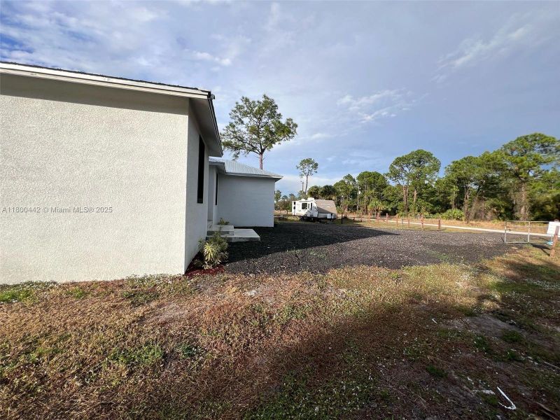 Front exterior of a new home in , Clewiston, FL, highlighting curb appeal (Image 16). Front exterior of a new home in , Clewiston, FL, highlighting curb appeal (Image 16).