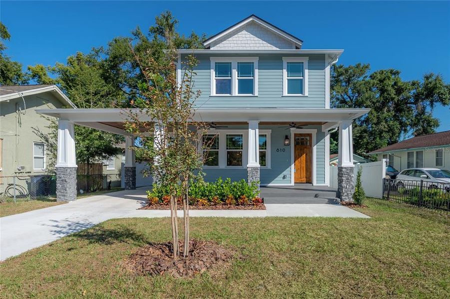 Front exterior of a new home in , Tampa, FL, highlighting curb appeal (Image 1). Front exterior of a new home in , Tampa, FL, highlighting curb appeal (Image 1).