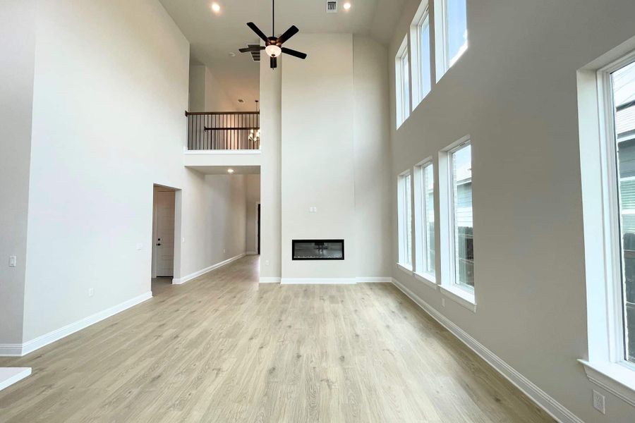Spacious, unfurnished interior of a new home in Whisper Valley, Manor (Image 22).