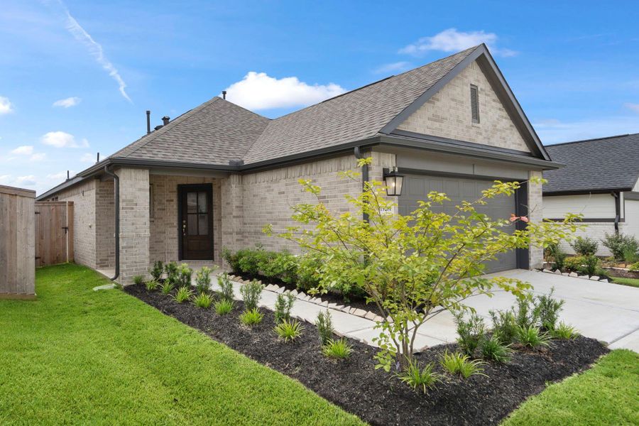 Front exterior of a new home in Attwater, Waller, TX, highlighting curb appeal (Image 22). Front exterior of a new home in Attwater, Waller, TX, highlighting curb appeal (Image 22).