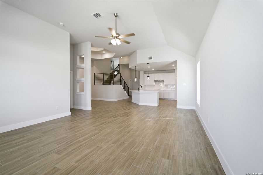 Spacious, unfurnished interior of a new home in The Woodlands at Medina Hills, Mico (Image 25).