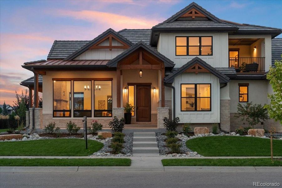Front exterior of a new home in , Berthoud, CO, highlighting curb appeal (Image 22).
