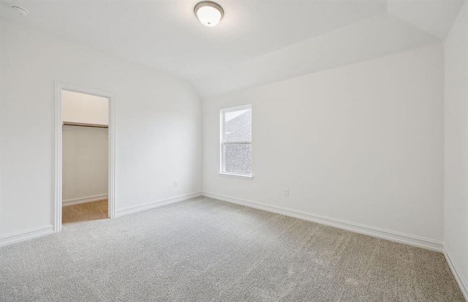 Spacious secondary bedroom features ample closet space *Real home pictured Spacious secondary bedroom features ample closet space *Real home pictured