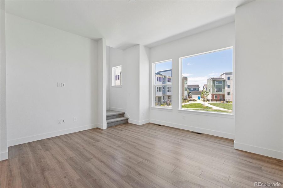 Spacious, unfurnished interior of a new home in Dillon Pointe - Skyview, Broomfield (Image 25).