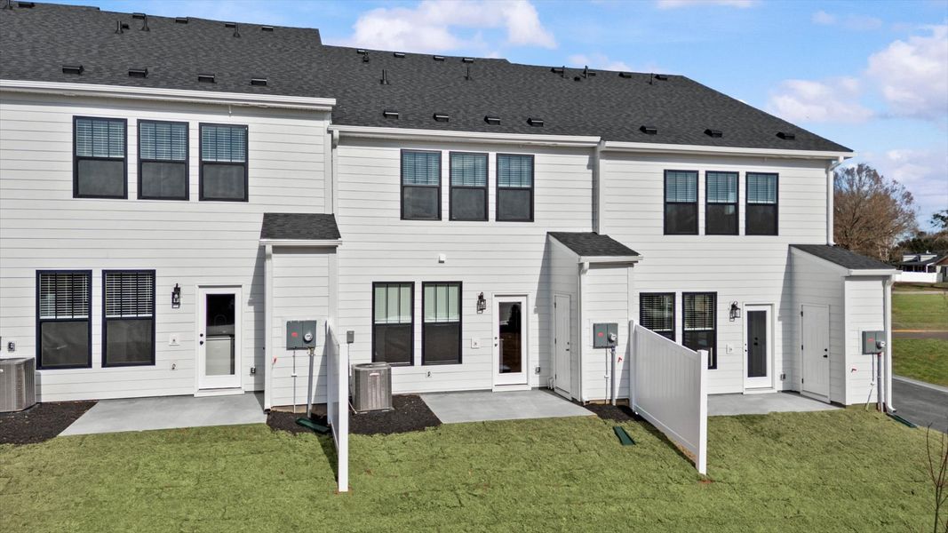 Exterior details and patio area of a home in Gresham Station, Simpsonville (Image 4).