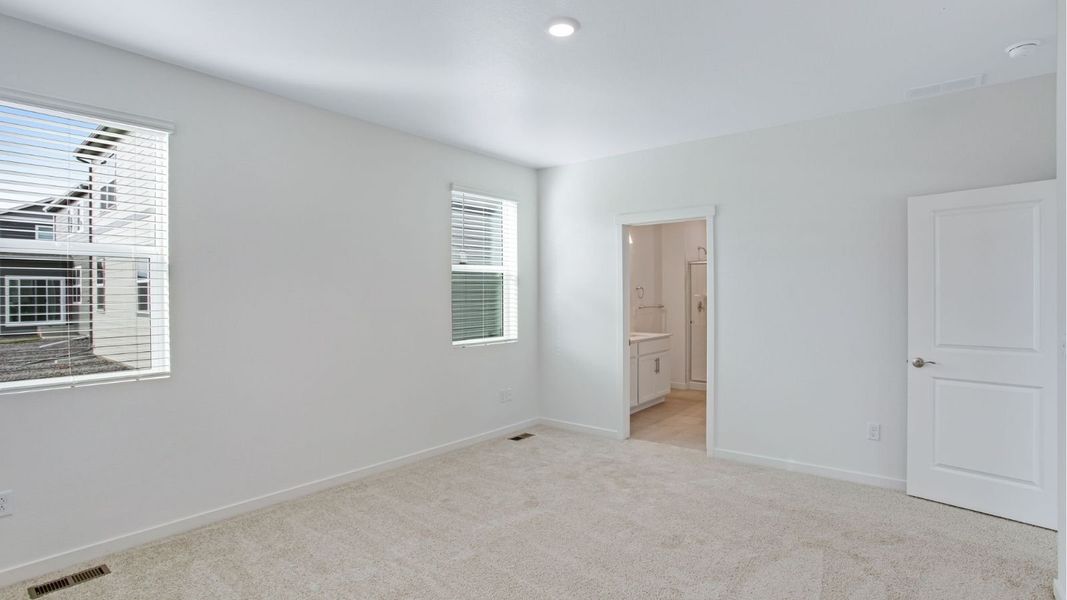 Representative unfurnished interior of a home built from the Newcastle by D.R. Horton in Tailholt, Severance (Image 12).