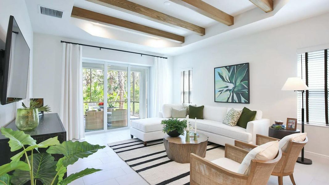 Furnished interior view inside a new home in Boca Royale Golf & Country Club Real Estate and Homes for Sale in Englewood, FL - Neal Communities, Englewood (Image 12). Furnished interior view inside a new home in Boca Royale Golf & Country Club Real Estate and Homes for Sale in Englewood, FL - Neal Communities, Englewood (Image 12).