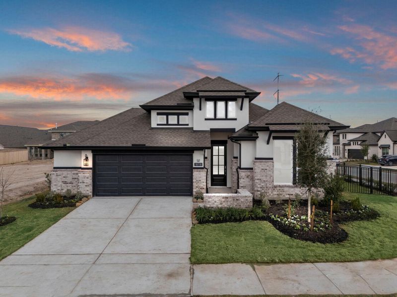 Front exterior of a new home in Bridgeland, Cypress, TX, highlighting curb appeal (Image 19).