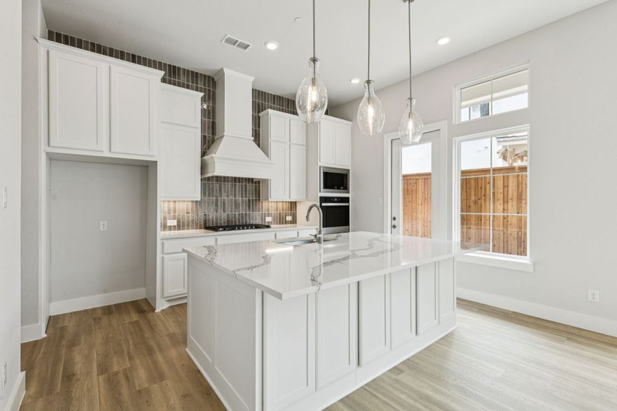 Representative furnished interior of a home built from the Hamilton by Centre Living Homes in Newman Village Townhomes, Frisco (Image 6).