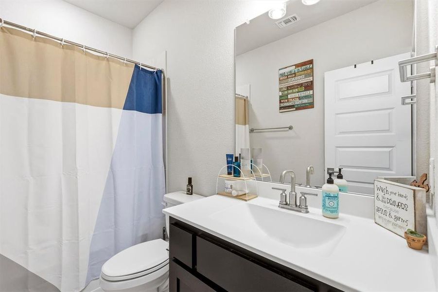 Bathroom 2 on the first floor has a tub shower combination Bathroom 2 on the first floor has a tub shower combination