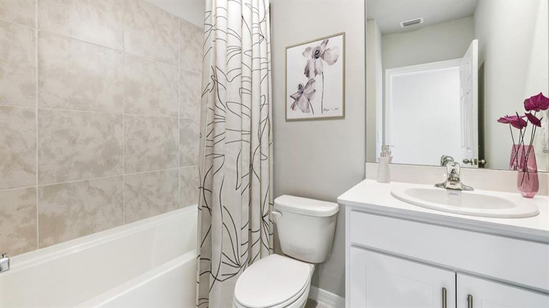 Furnished interior view inside a new home in Burnt Store Village, Punta Gorda (Image 9).