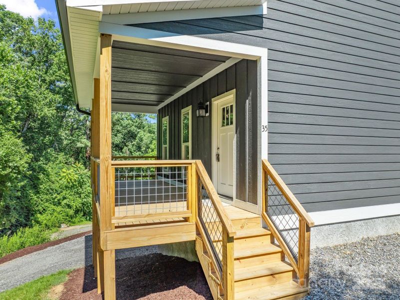 Front exterior of a new home in , Asheville, NC, highlighting curb appeal (Image 24).