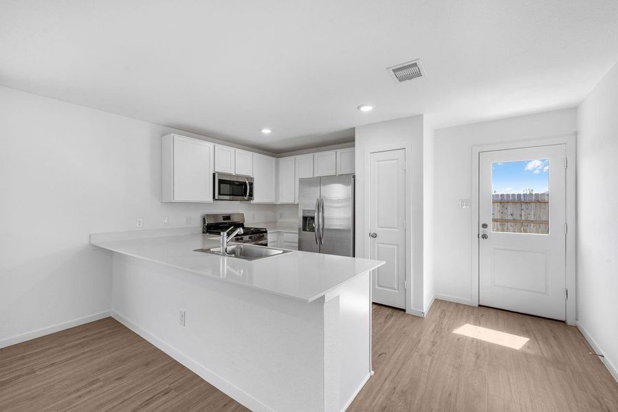 Furnished interior view inside a new home in Tavola, New Caney (Image 6).