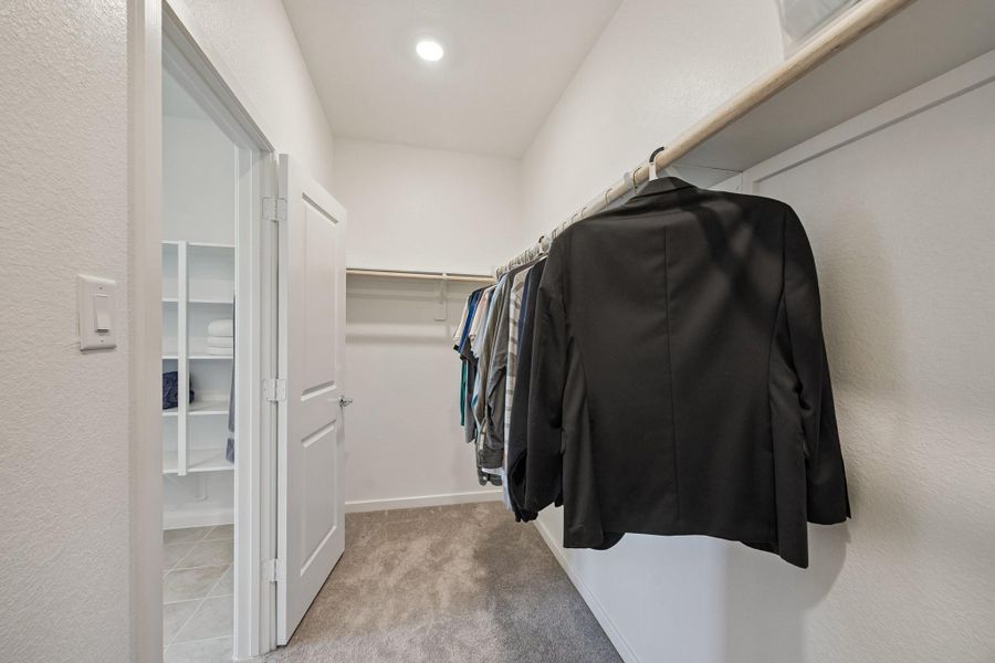 Closet in the Primary Suite offers abundant space for wardrobe organization and effortless daily living.