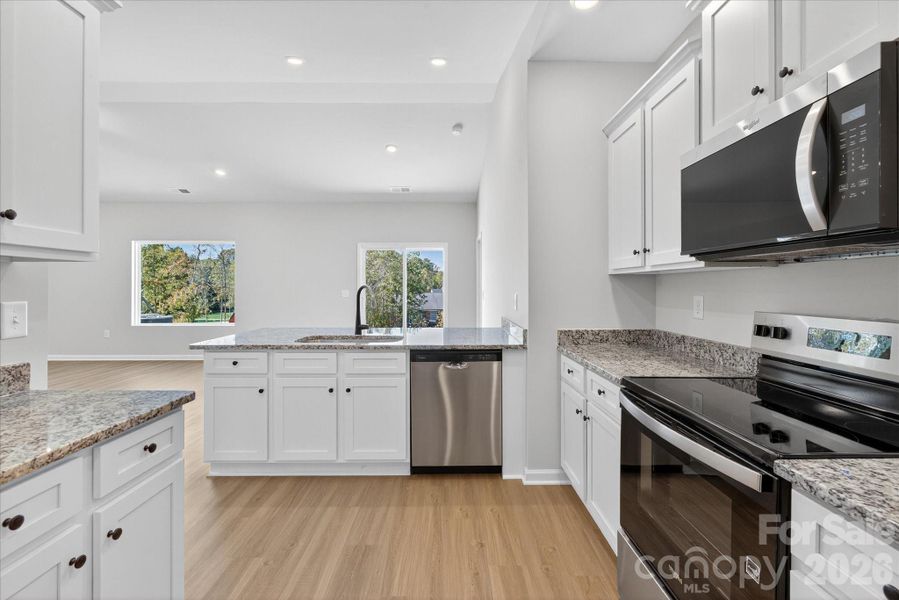 Furnished interior view inside a new home in Stagecoach Station, Gastonia (Image 10).