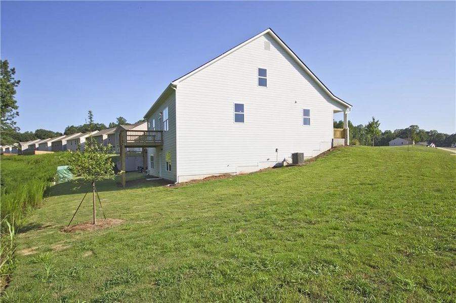 Exterior details and patio area of a home in Clark Farms, Flowery Branch (Image 25). Exterior details and patio area of a home in Clark Farms, Flowery Branch (Image 25).