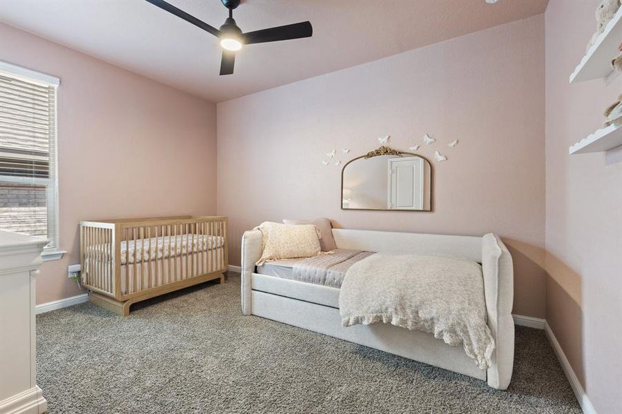 Bedroom #3 featuring carpet floors, baseboards, and ceiling fan Bedroom #3 featuring carpet floors, baseboards, and ceiling fan