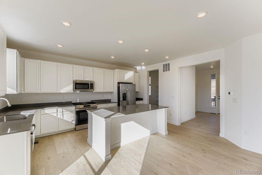 Furnished interior view inside a new home in Vermilion Creek: The Pioneer Collection, Centennial (Image 5).