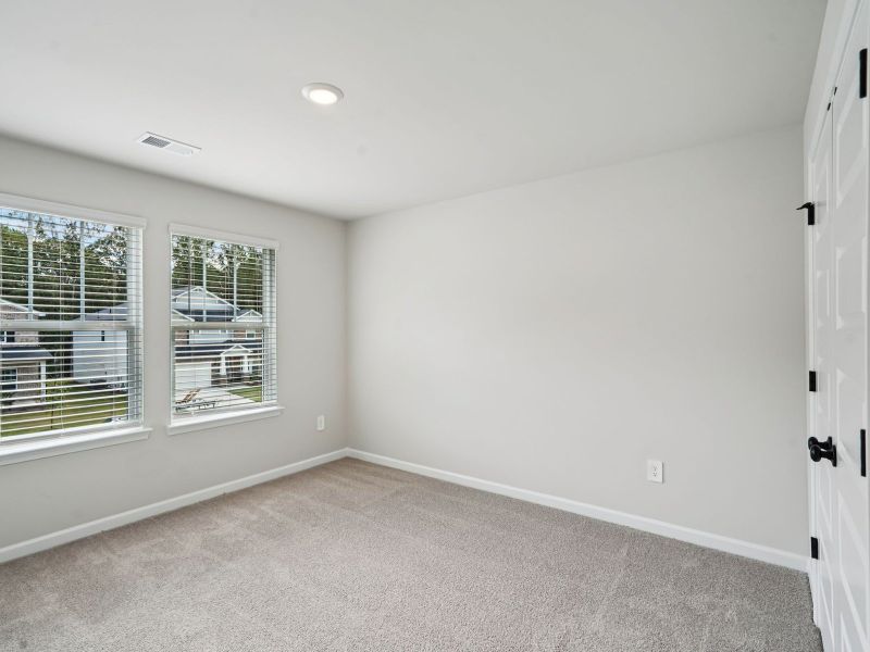 The Taylorsville floorplan with the Divine White interior package.