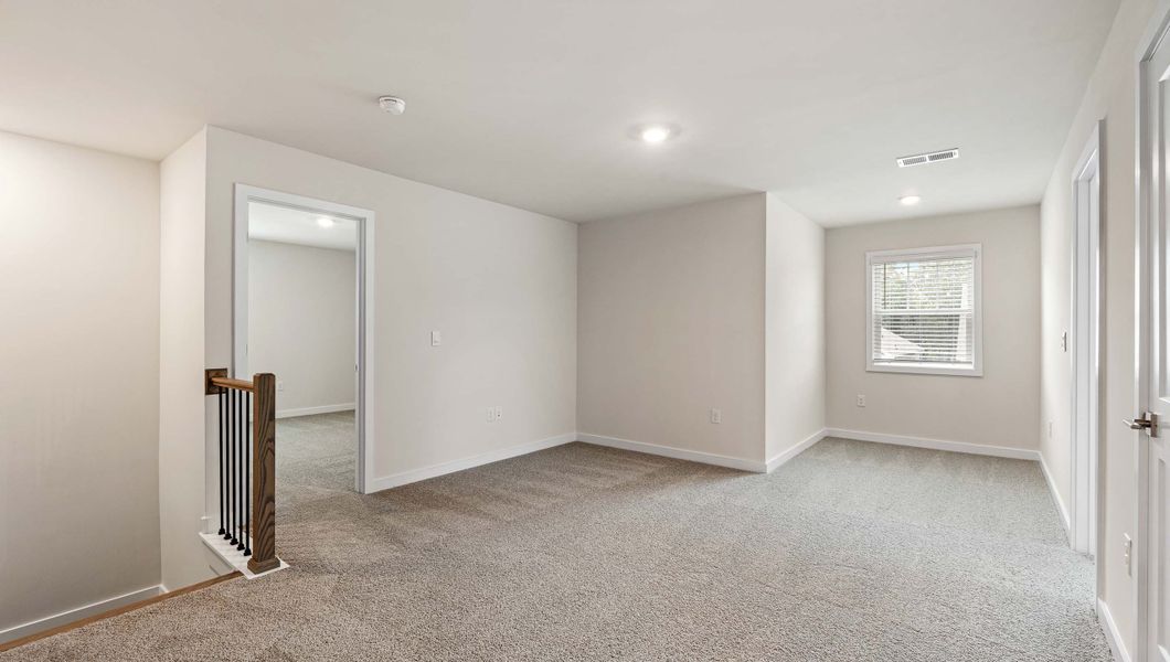 Spacious, unfurnished interior of a new home in Adams Glen, Greenville (Image 25).