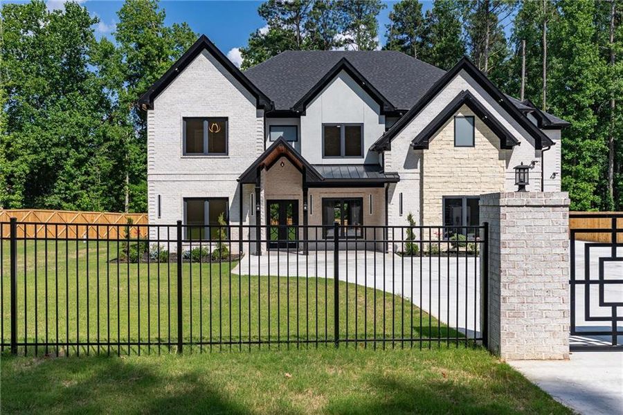 Front exterior of a new home in , Lawrenceville, GA, highlighting curb appeal (Image 40). Front exterior of a new home in , Lawrenceville, GA, highlighting curb appeal (Image 40).