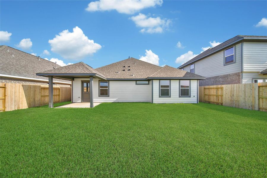 Exterior details and patio area of a home in , Rosharon (Image 19). Exterior details and patio area of a home in , Rosharon (Image 19).