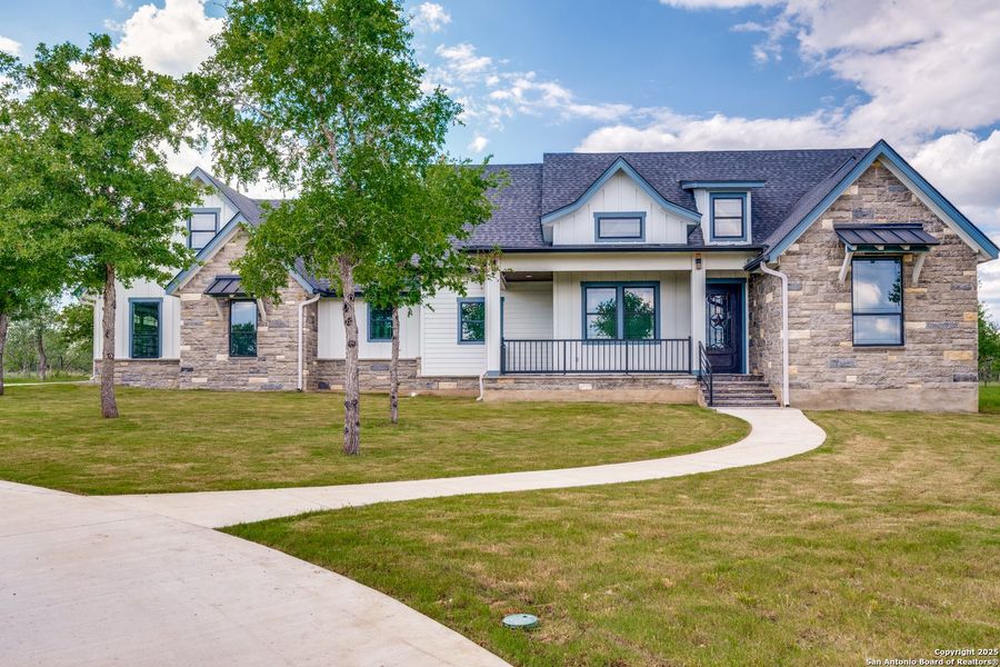 Front exterior of a new home in , Gonzales, TX, highlighting curb appeal (Image 26). Front exterior of a new home in , Gonzales, TX, highlighting curb appeal (Image 26).