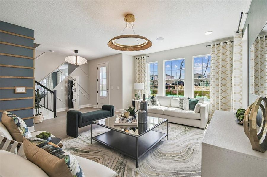 Furnished interior view inside a new home in Lake Star at Ovation, Winter Garden (Image 31).