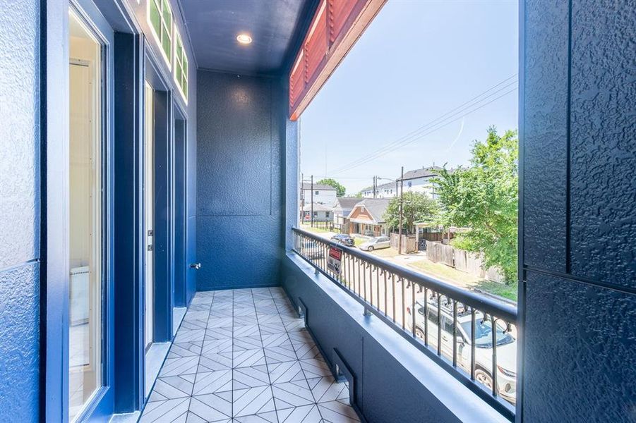 2nd floor balcony and the actual home has a tree in front of it giving you shade from the Houston sun.