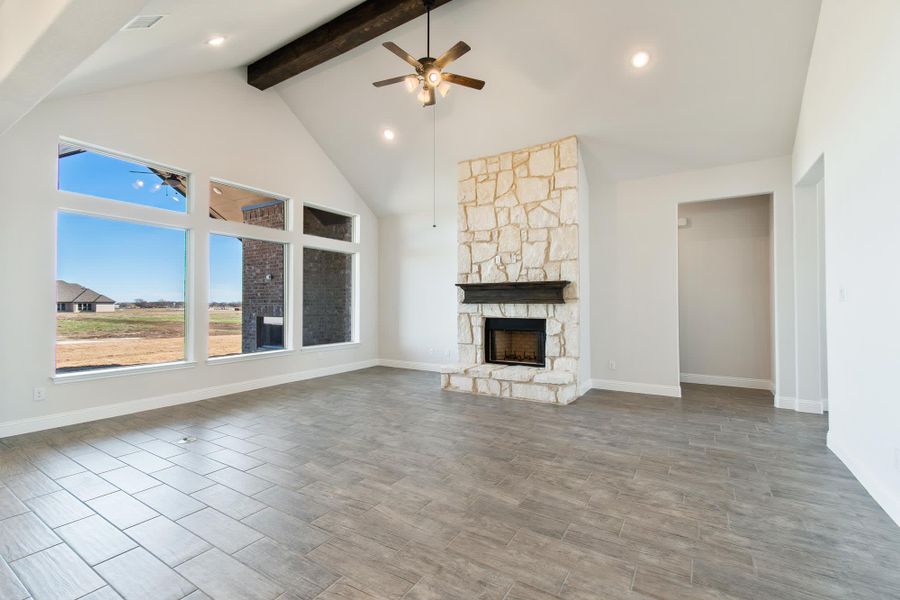 Family Room | Concept 3141 at Hidden Creek Estates in Van Alstyne, TX by Landsea Homes