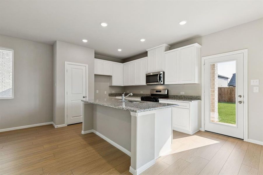 Furnished interior view inside a new home in AnaCapri, Anna (Image 7).