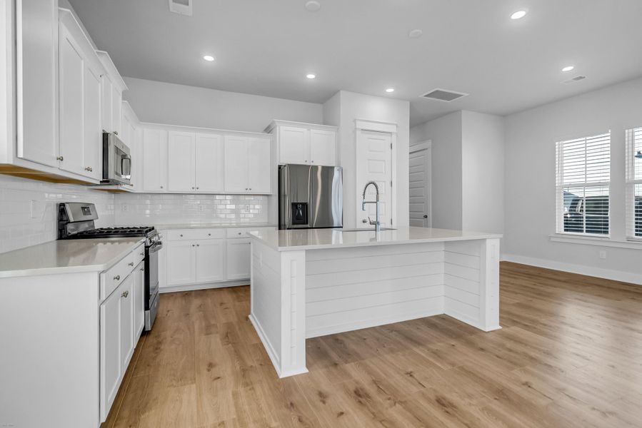 Furnished interior view inside a new home in Carnes Crossroads: Row Collection, Summerville (Image 5). Furnished interior view inside a new home in Carnes Crossroads: Row Collection, Summerville (Image 5).