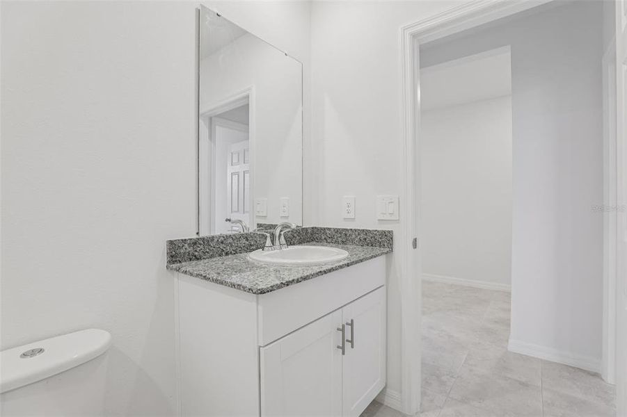 Furnished interior view inside a new home in Deer Run at Crosswinds, Davenport (Image 31).