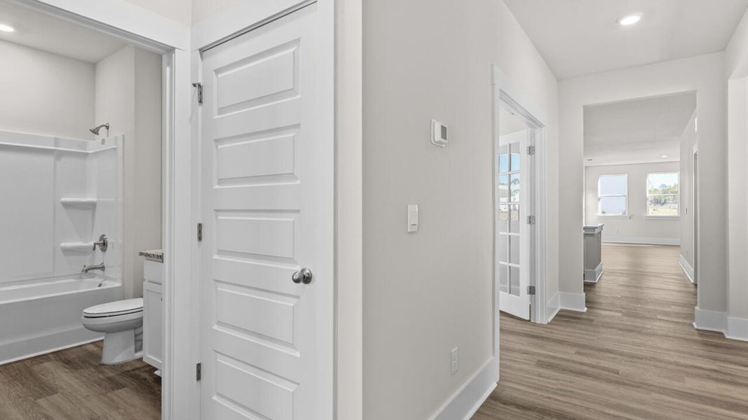 Spacious, unfurnished interior of a new home in The Haven at Indigo Preserve, Leland (Image 20).