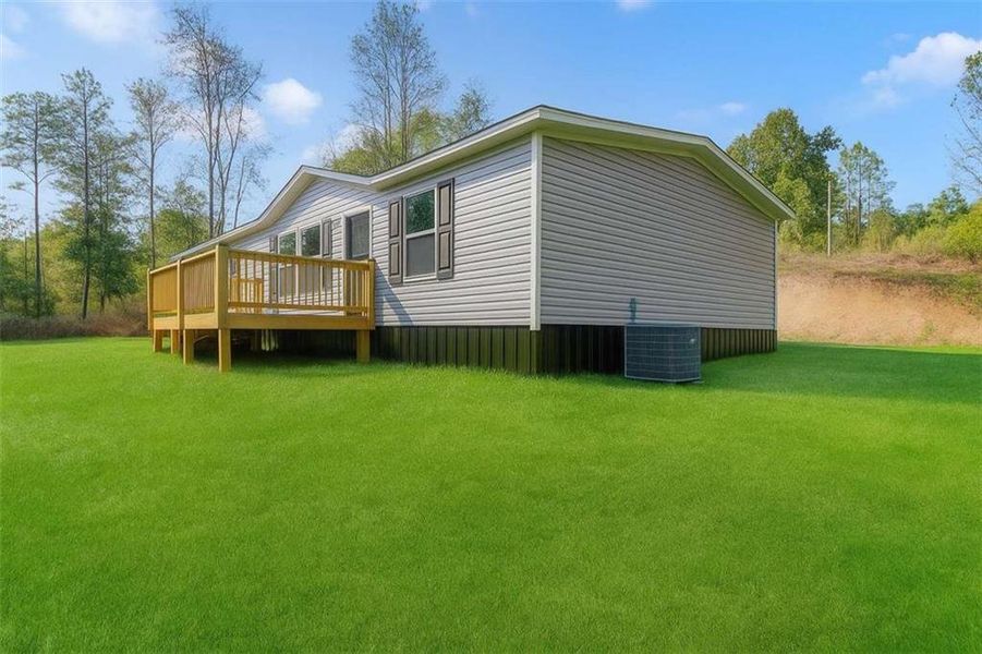 Exterior details and patio area of a home in , Ellijay (Image 24).