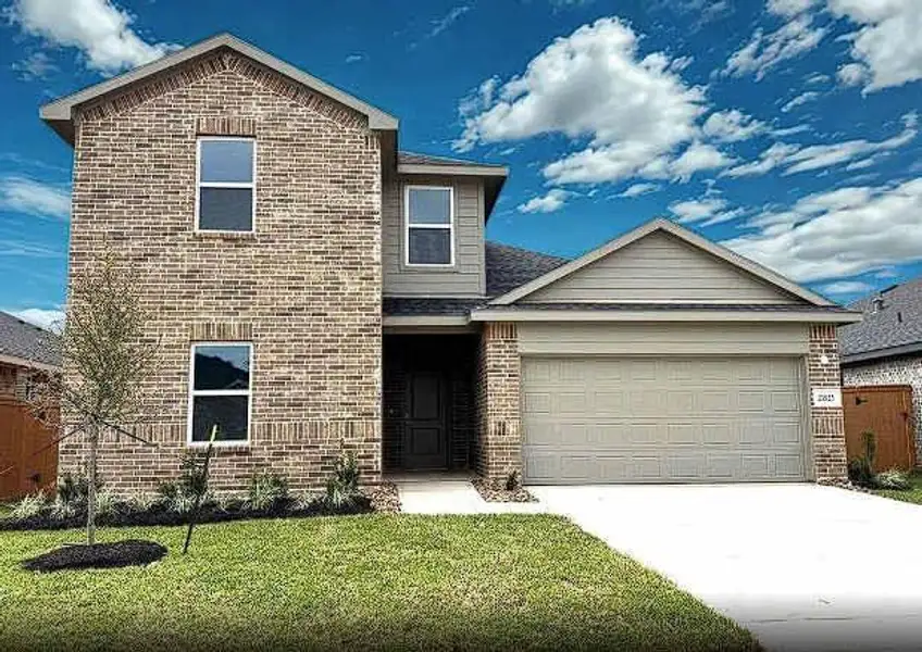 Front exterior of a new home in Sunterra, Katy, TX, highlighting curb appeal (Image 1). Front exterior of a new home in Sunterra, Katy, TX, highlighting curb appeal (Image 1).