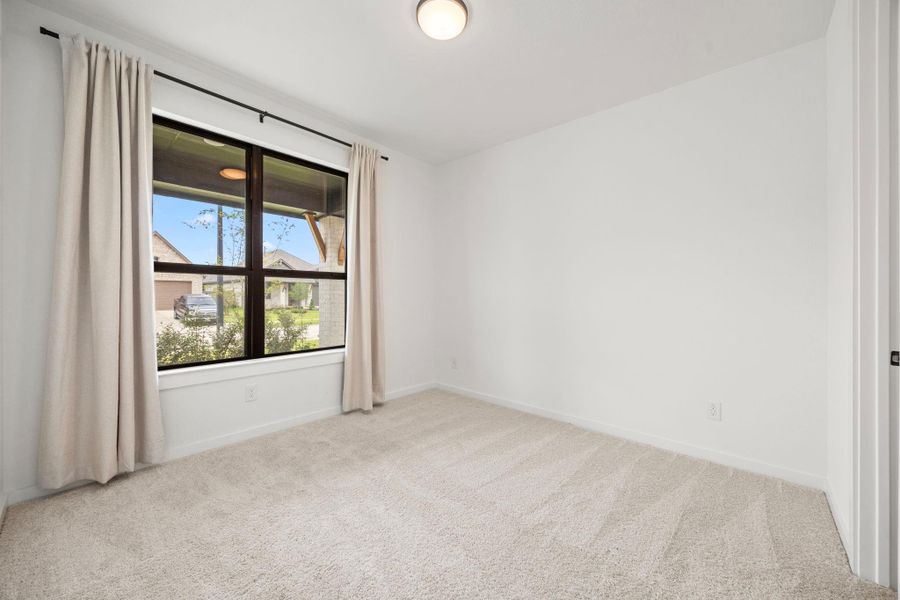 The first guest bedroom has an ensuite bathroom and is downstairs for easy access.