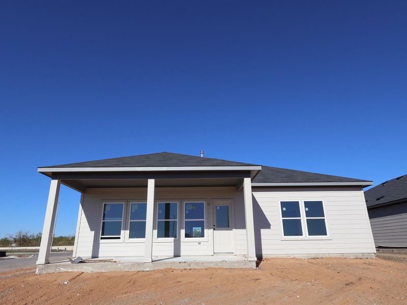 Exterior details and patio area of a home in Carillon, Manor (Image 3).