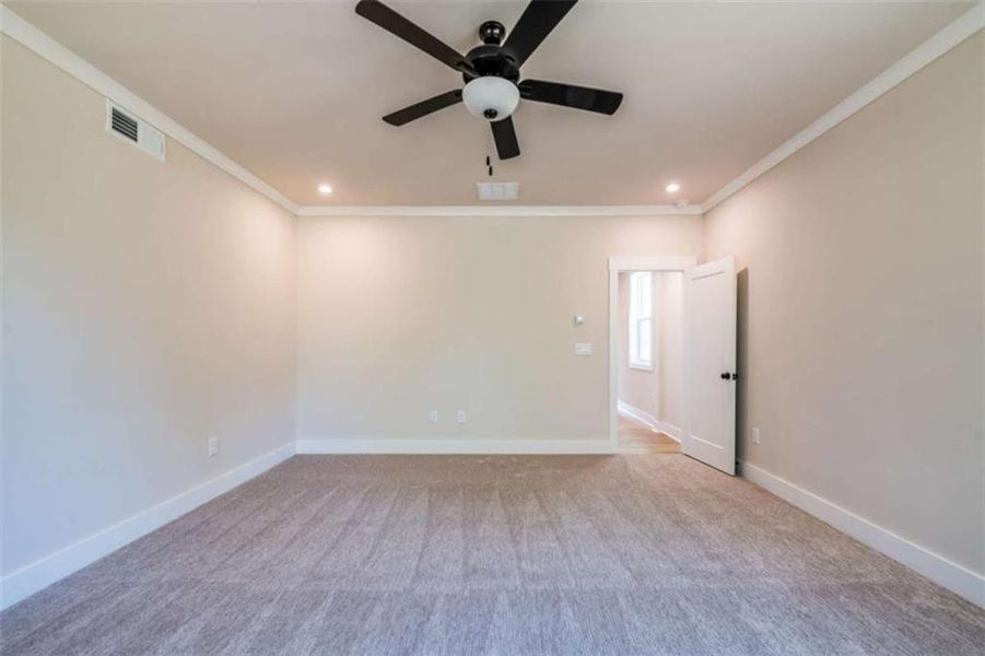 Spacious, unfurnished interior of a new home in The Paddocks at Doc Hughes, Buford (Image 23).