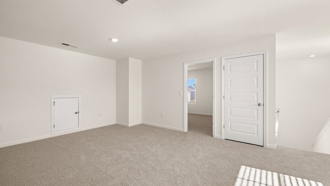 Representative unfurnished interior of a home built from the Belfort by D.R. Horton in Locust Grove Station - Cedar Ridge, Locust Grove (Image 21).