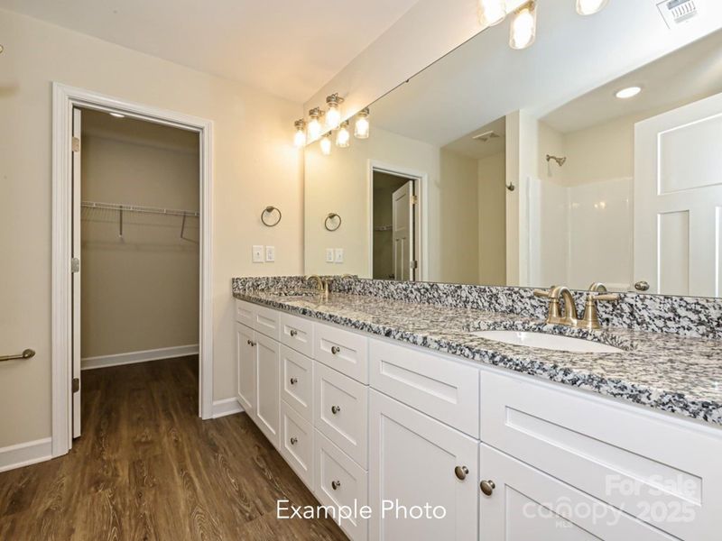 Example Photo Example Photo