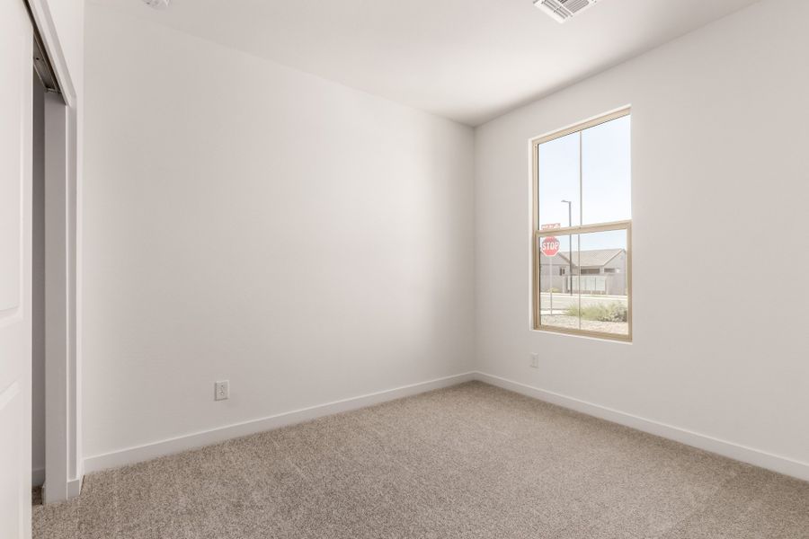 Spacious, unfurnished interior of a new home in The Villages at North Copper Canyon, Surprise (Image 10).