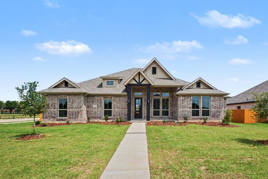 Front exterior of a new home in Ten Mile Creek Estates, DeSoto, TX, highlighting curb appeal (Image 19).