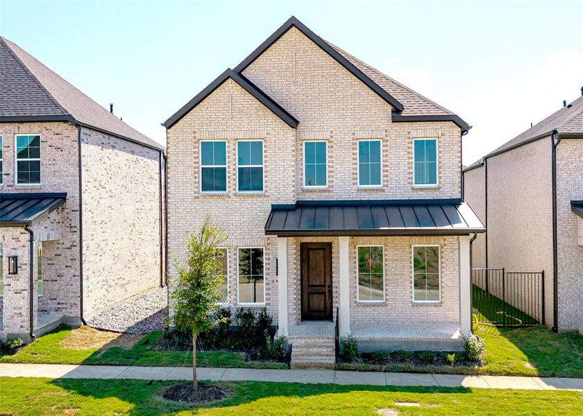 Front exterior of a new home in Hazelwood 40' Series, Frisco, TX, highlighting curb appeal (Image 1).