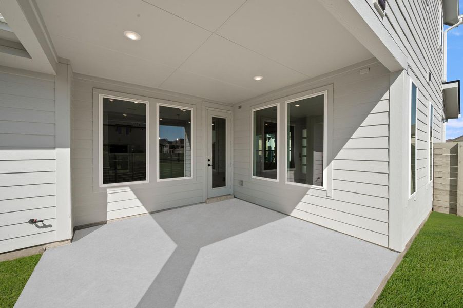 Exterior details and patio area of a home in The Retreat at Harvest, Argyle (Image 4). Exterior details and patio area of a home in The Retreat at Harvest, Argyle (Image 4).